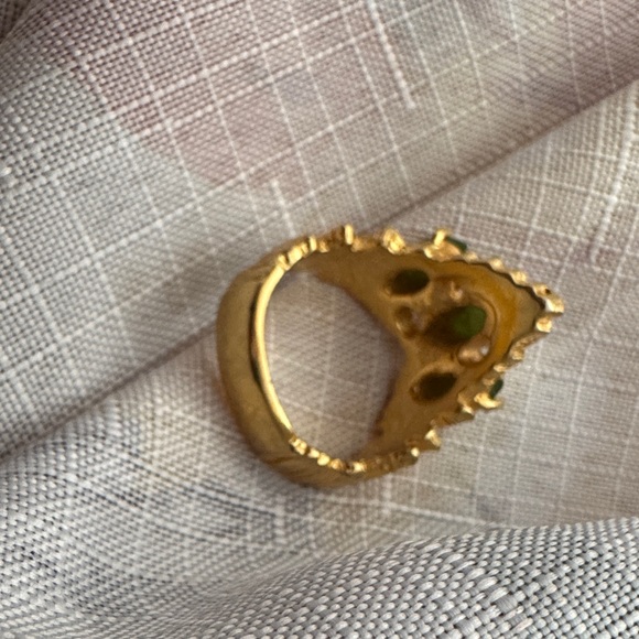Elegant Gold Ring with Green Accents